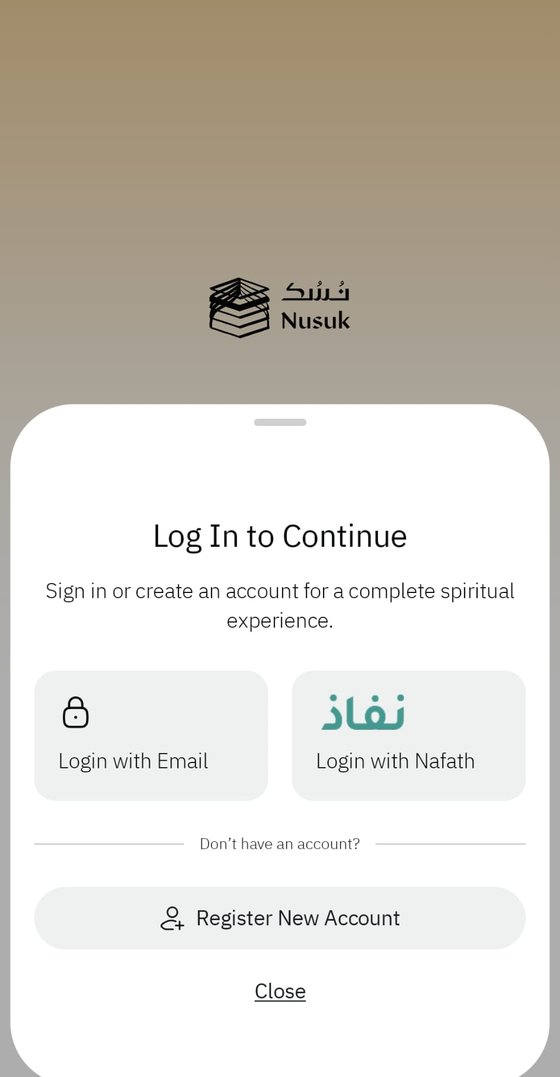 شاشة الدخول في نُسُك، وفيها خيار تسجيل الدخول بالبريد الإلكتروني
